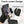 Black gloves with touch screen sensor pads on fingertips holding a smartphone