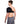 Person wearing a black Onyx shoulder ice wrap with adjustable straps