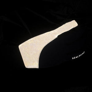 Reflective panel on black Sealskinz garment