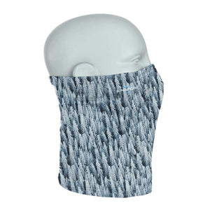 Seirus neck gaiter with a snowy pine forest print on a mannequin head
