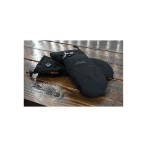 Seirus black heated mittens on a wooden surface
