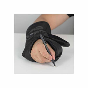 Hand wearing a black Seirus glove holding a pen
