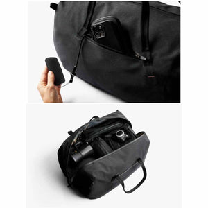 Bellroy black duffel bag with external phone pocket and interior storage compartments