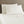 Shavel white bed sheet set with two pillows on a bed
