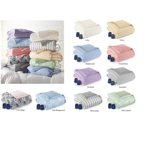 Assorted colors and patterns of heated electric blankets with remote controls