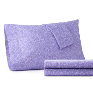 Purple pillowcase and folded sheet set with a tone on tone floral damask pattern