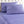 Purple bed sheets and pillowcases with a tonal paisley pattern