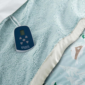 Shavel heated blanket controller on light blue textured fabric