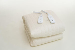 Shield Life cream quilted heating pad with two white handheld controllers