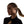 Woman wearing black Shokz open ear headphones