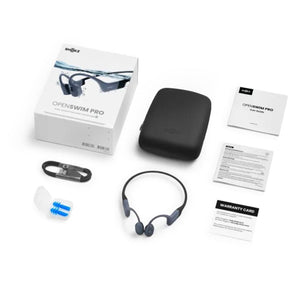 Shokz OpenSwim Pro bone conduction headphones with charging cable, carrying case, earplugs, and documentation