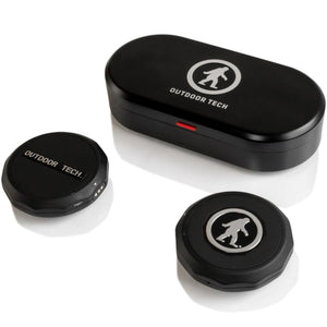 Outdoor Tech wireless audio pucks and charging case