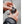 Hands attaching a side shield to Smith Optics sunglasses