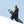 Snowboarder wearing Smith Optics goggles and winter gear standing on a snowy slope