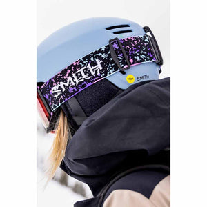 Smith ski helmet in light blue with patterned goggle strap and Mips branding