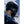 Back view of a person wearing a black Smith Optics Method snow helmet and goggles