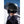 Back view of person wearing olive green Smith Optics helmet with MIPS technology in snowy mountain setting