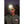 Person wearing Smith Optics yellow frame sunglasses and a headlamp
