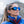 Woman wearing Smith glacier sunglasses with blue mirrored lenses