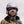 Person wearing a white Smith Optics helmet and mirrored goggles
