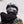 Back view of a person wearing a white Smith Optics Vida ski helmet and goggles