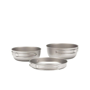 Three nesting titanium camping pots with folding handles