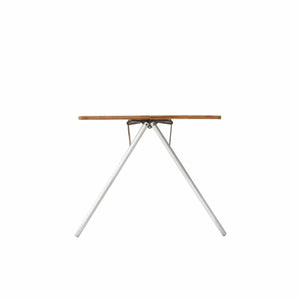 Snow Peak folding table with bamboo top and metal legs viewed from the side