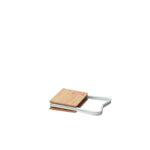 Folded Snow Peak bamboo table with metal frame