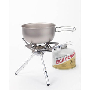 Snow Peak camping stove with a titanium pot attached to a Giga Power fuel canister