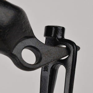 Close up of black cast iron Snow Peak cooking equipment hinge mechanism