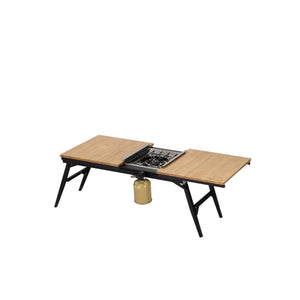 Snow Peak IGT camping table with integrated gas stove and fuel canister