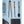 Black metal campfire tongs, poker, and spatula with wooden handles on snow