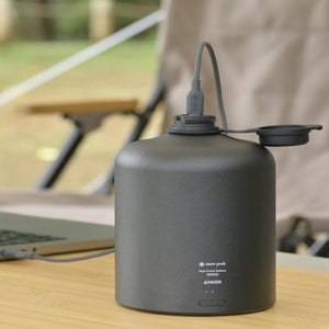 Snow Peak Giga Power Battery 30000 by Anker on a wooden table