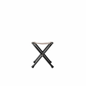 Snow Peak folding stool with black metal frame and tan fabric seat