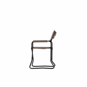 Snow Peak folding camp chair in side view with black frame and tan fabric