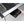 Hand sliding a black tray into a Snow Peak metal camping table