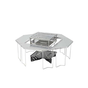 Snow Peak stainless steel camping grill table set with central fire pit
