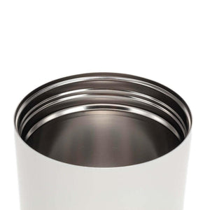 Top view of a stainless steel bottle opening with visible screw threads