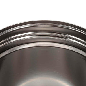 Close up view of the interior rim of a stainless steel pot
