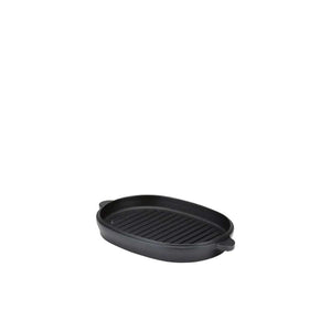 Oval cast iron grill pan with ridged surface