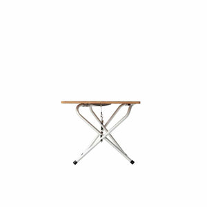 Snow Peak folding table with wooden top and white metal legs