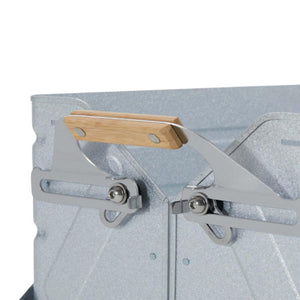 Close up of galvanized metal container with wooden handle and metal latch