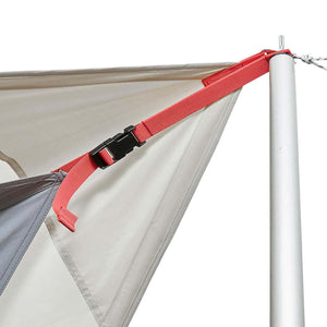 Red adjustable strap with black buckle attached to a tent pole and canopy