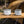 Snow Peak Ti-Double Wall 450 and 300 mugs with product labels on a wooden table