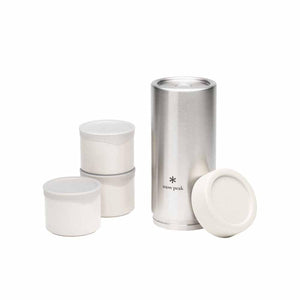 Snow Peak stainless steel food jar set with three white containers and a metallic canister