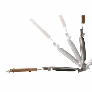 Metal sandwich press with wooden handles showing opening motion