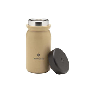 Beige Snow Peak insulated bottle with a detached black lid