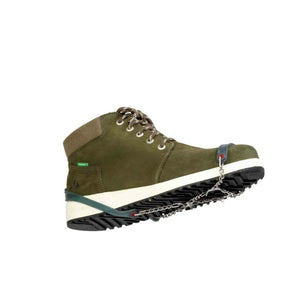 Snowline traction spikes attached to an olive green hiking boot