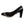 Snowline traction spikes attached to a black high heel shoe