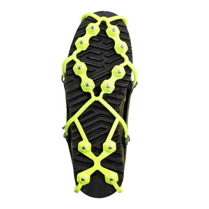 Snowline traction spikes attached to the sole of a boot